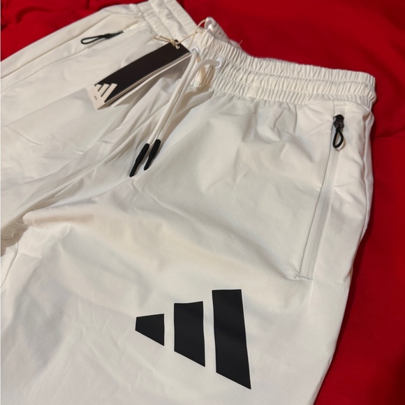 White Joggers with Black Logo